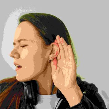 Young woman with hearing gesture. Hearing people problems. Ear day